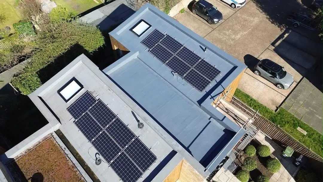 Flat roof with solar panels and rooflights from above