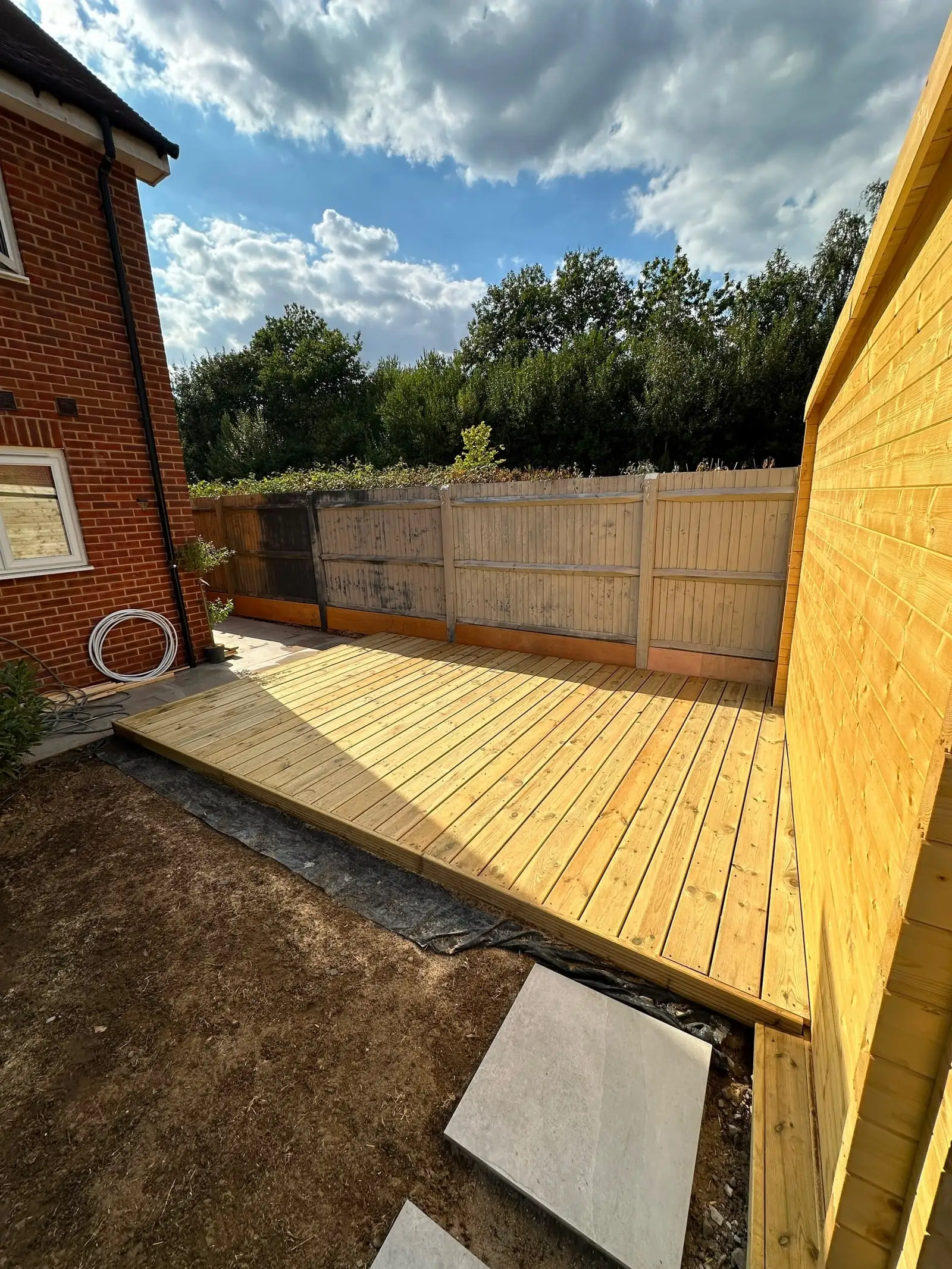 Garden room with decking alongside