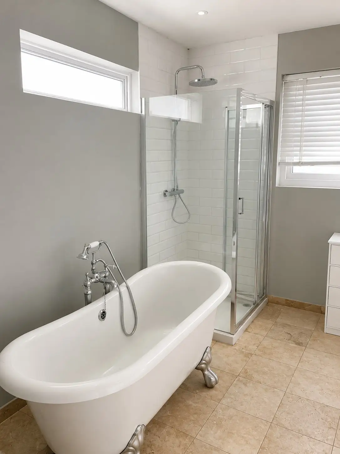 Bathroom with freestanding roll-top bath and walk-in shower