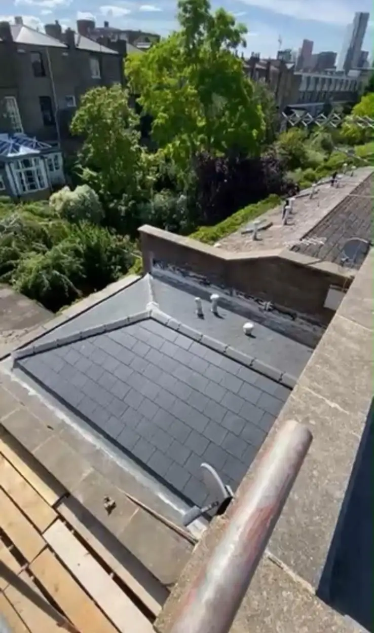 Slate roof slope overlooking London gardens